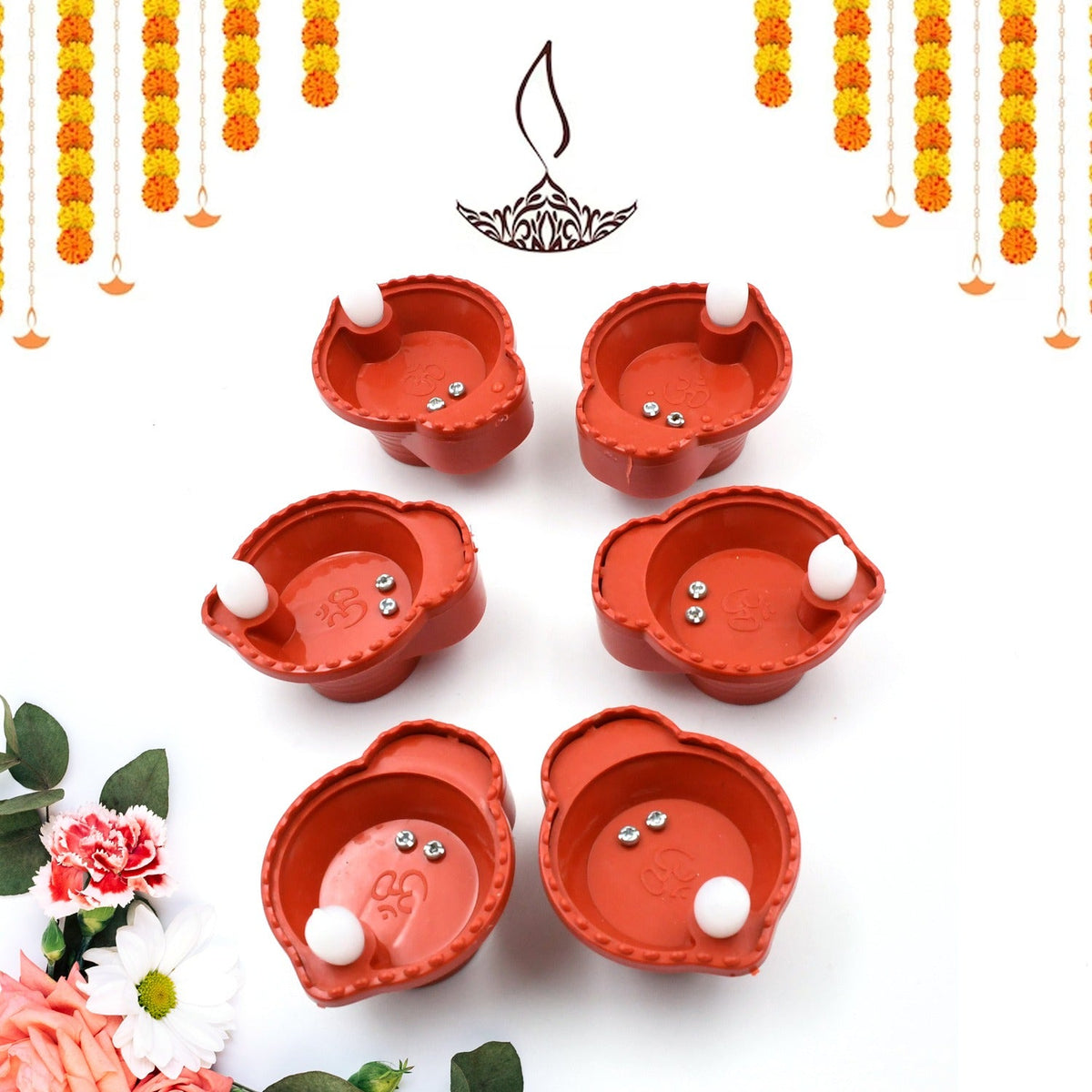 Multiple bright Water Sensor Diyas glowing in a festive low-light setting.